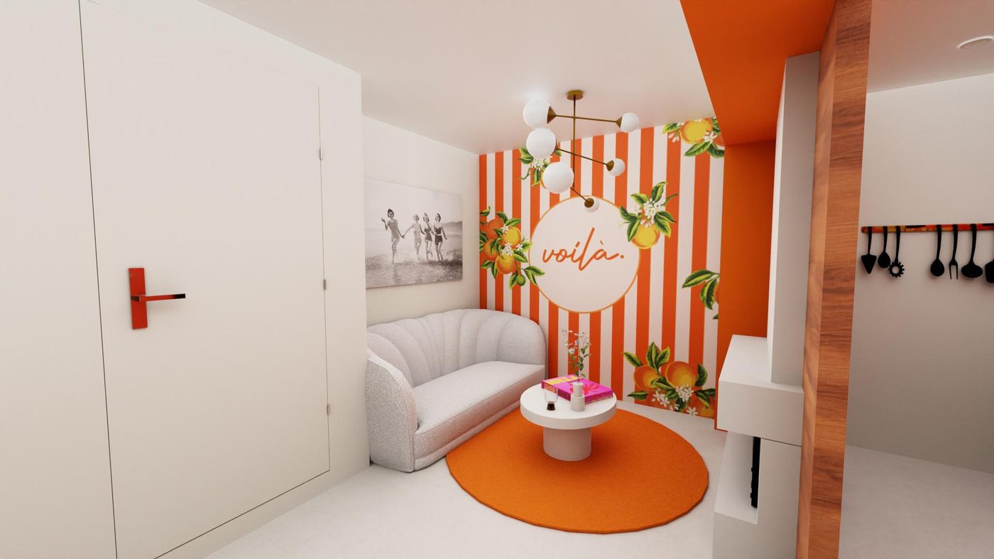 Le salon de l'agence — canapé blanc et médaillon Voilà